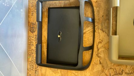 Housing for a flip down LCD screen