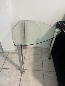 Three glass living room tables