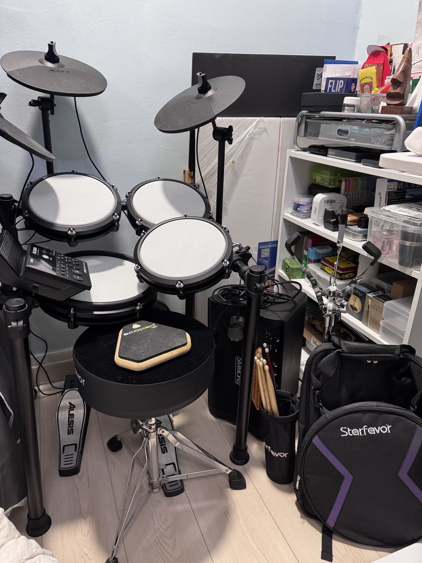 Electrical drum set, amplifier, drum practice pad, and drum throne