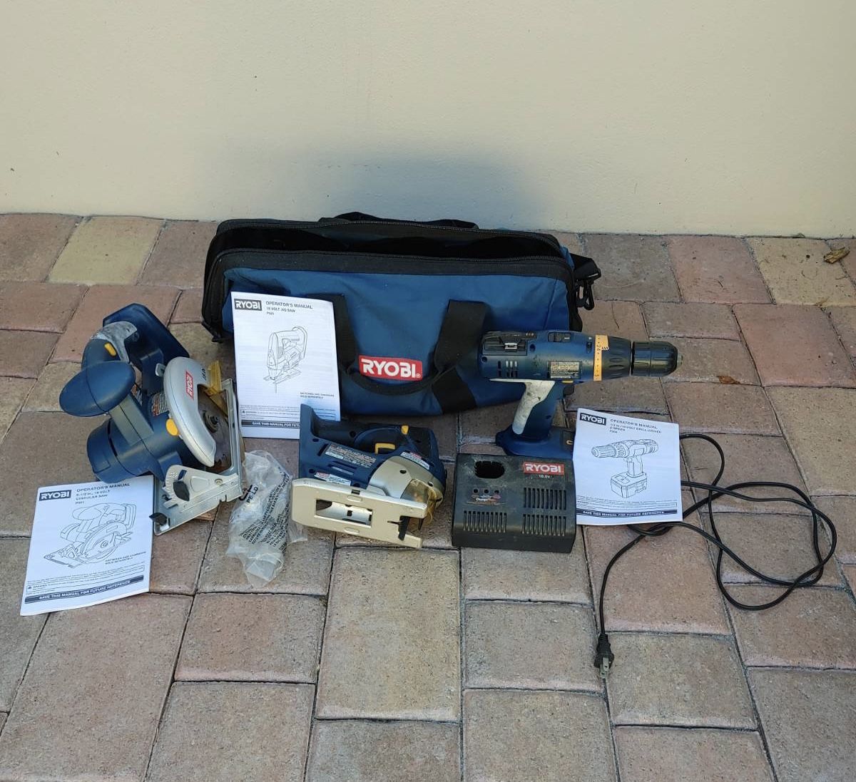 Preowned bunch of Ryobi power tools needs battery pack