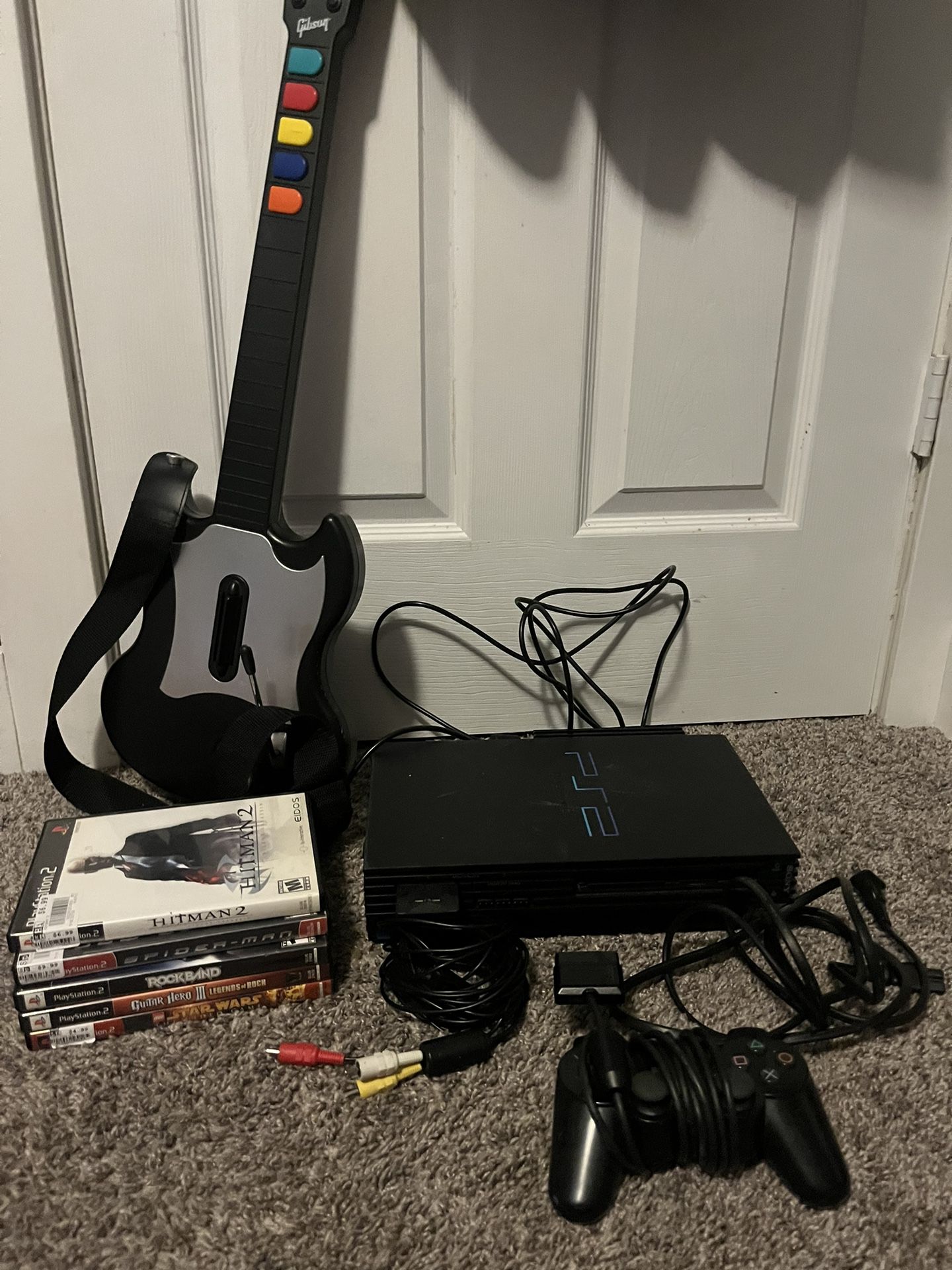 PS2 Console With Memory Card And Controller, 5 Games, And Guitar Hero Controller 