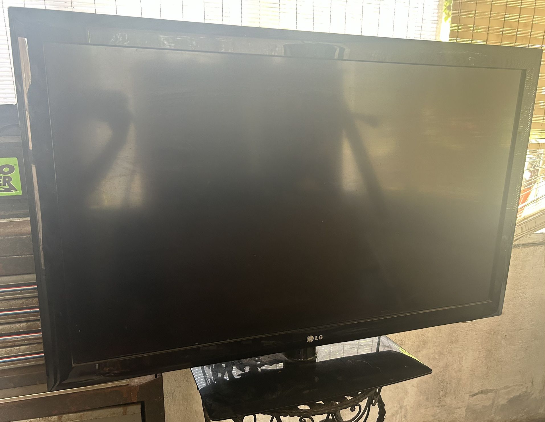 Flat Screen With Stand & HDMI Cord $50