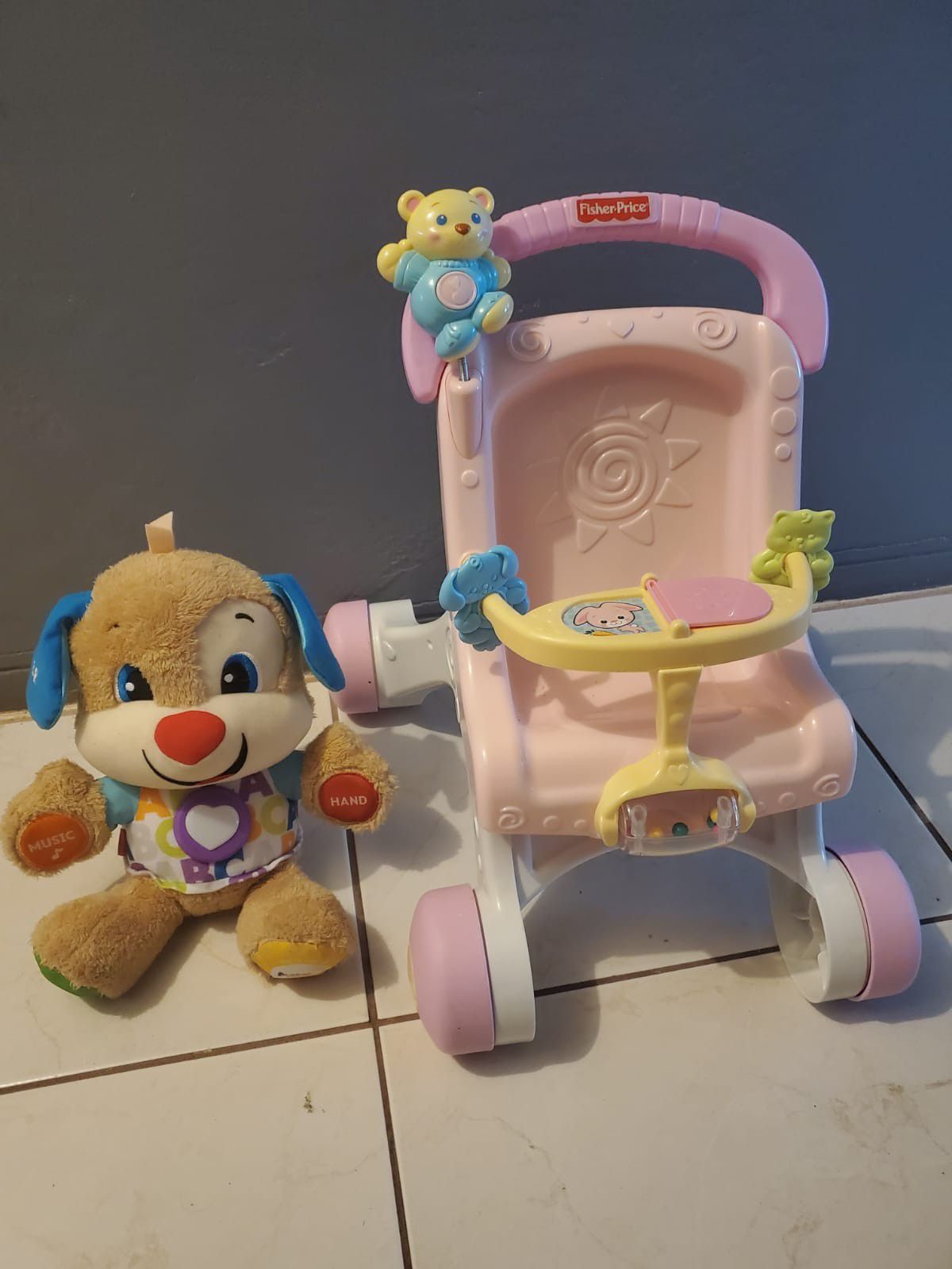 BABY DOLL WALKER AND A FISHER PRICE EDUCATIONAL DOLL