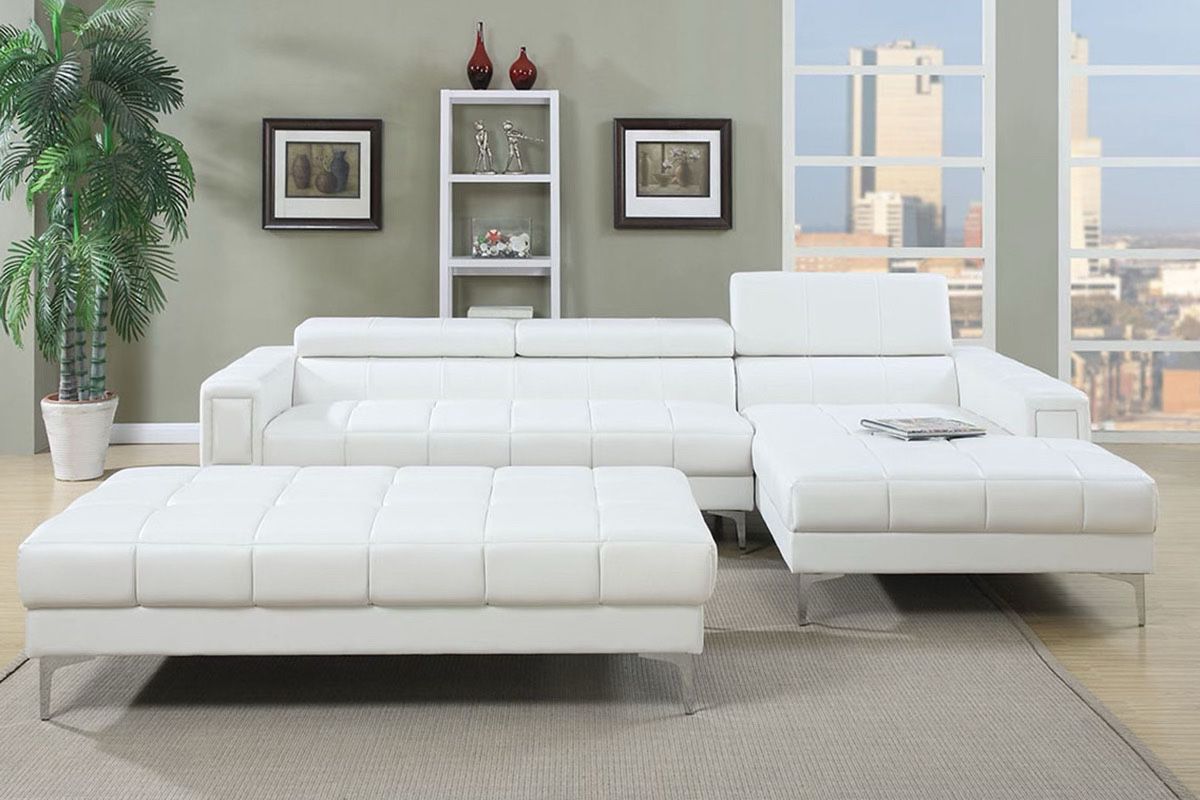 White leatherette sectional WTH ottoman