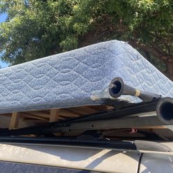 Queen/Full bed frame an box spring, mattress like new
