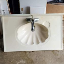 Sink,computer mouse,and mirror 