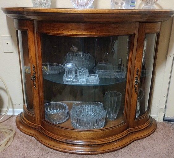 Vintage-style wooden curio cabinet
