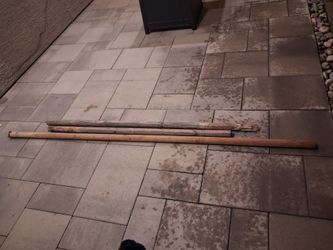 Wooden poles for tree support