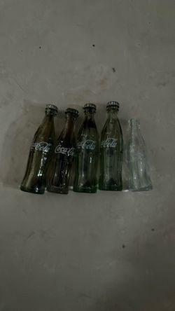 Vintage mini Coca-Cola bottles