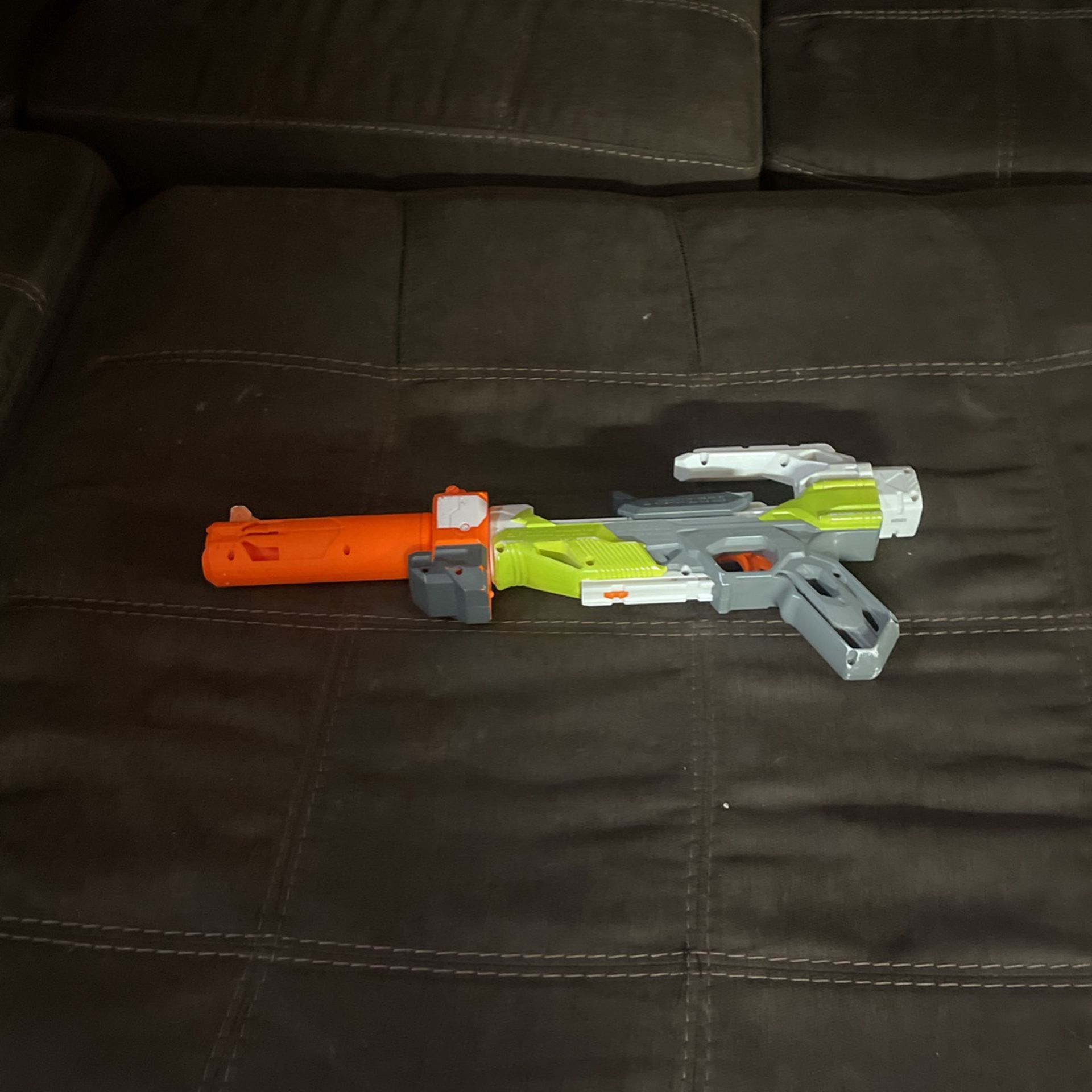 small Nerf gun with suppressor takes one bullet 