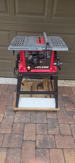 Skill table saw with stand.
