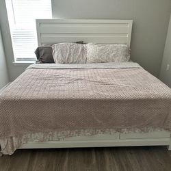 Full size quarter set with chest of drawers and two white bedside tables 
