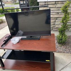 $40 tv stand and 39 in tv . 