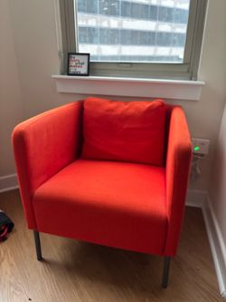 IKEA EKERÖ armchair in Skiftebo Orange.