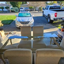 Glass Table And 6 Chairs 