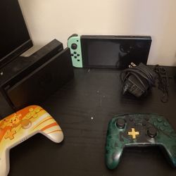 Nintendo Switch With Two Controllers Charger And Dock