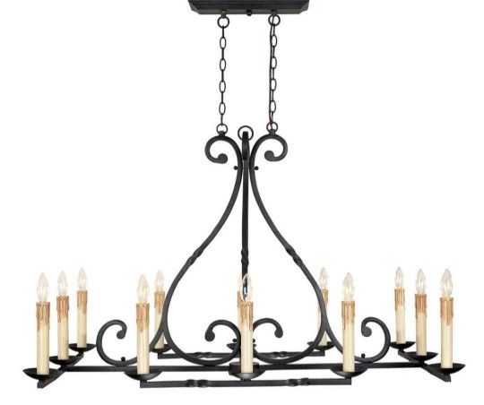 Rennes 12-Light Rust Chandelier (WI)
Update your home with this simple chandelier. Twisted arms and curls illuminated by twelve dripping candle