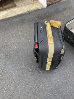 50 pound luggage with wheels rolling