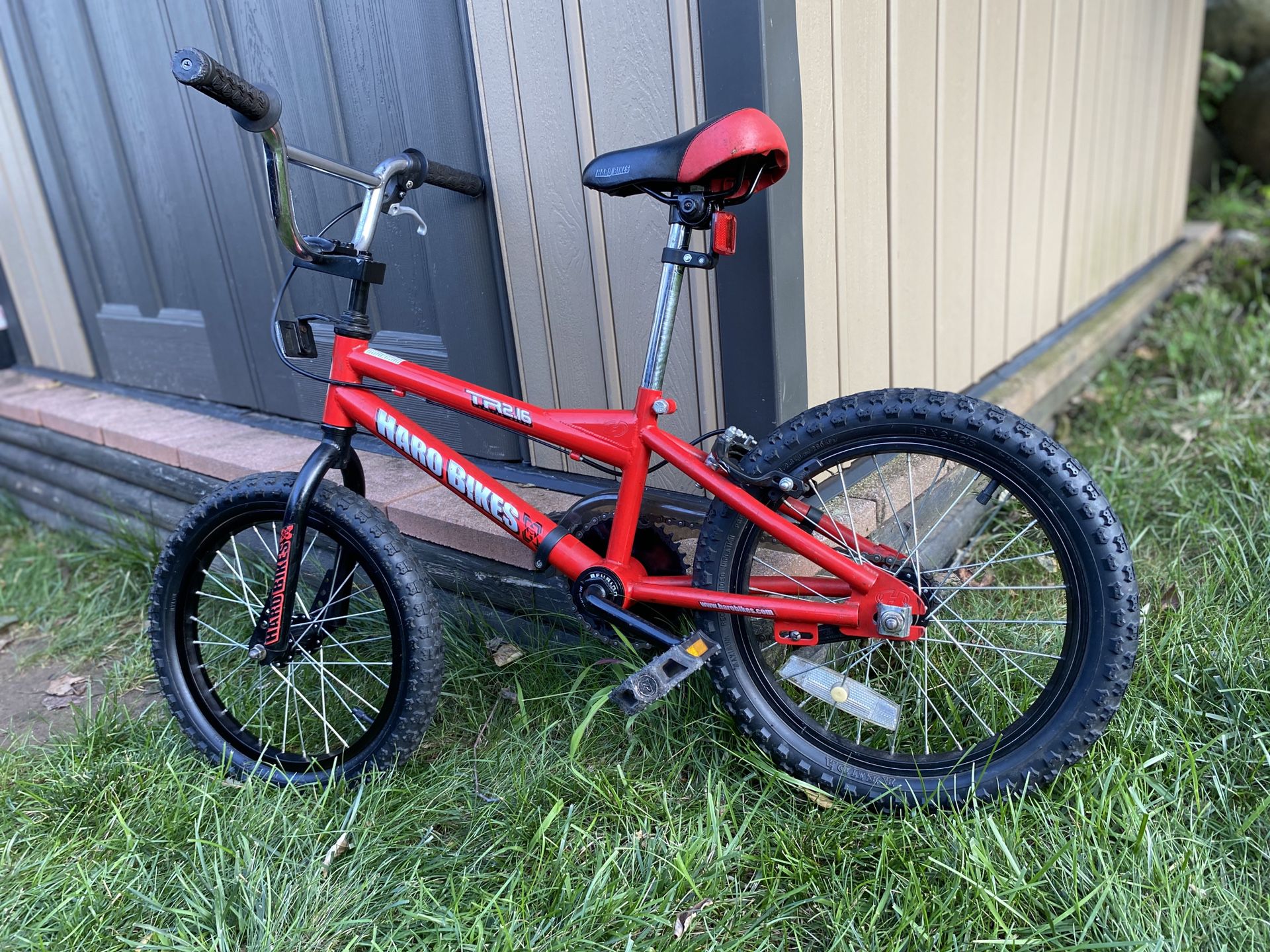 Kids Haro bmx style bike with 16” tires & coaster brakes, barely used!