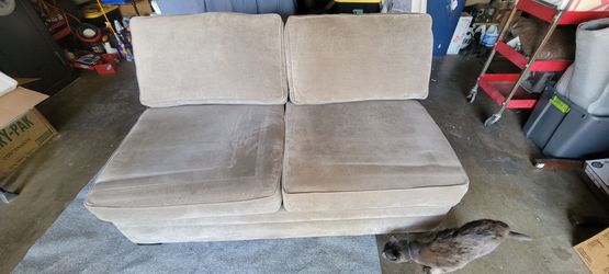 Love seat couch/fold out