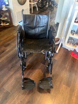 Drive Medical Wheelchair with Full Arms and Removable Swing-Away Footrest