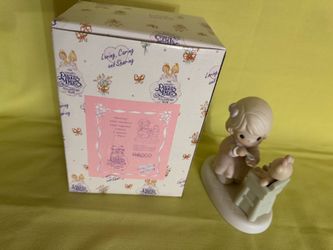 Precious moments, Sharing figurine
