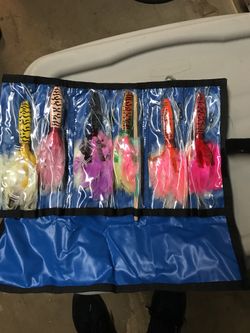 Weighted trolling feather