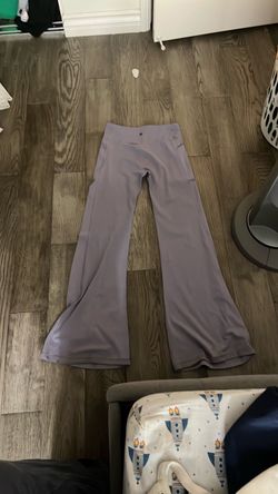 Lavender purple athleta girl flare pants with pockets.