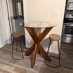 Glass top Table With Wood Base And Stools. Bar Height