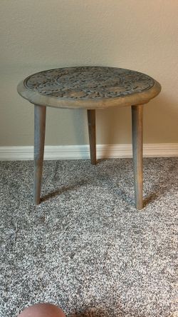 carved wood side table