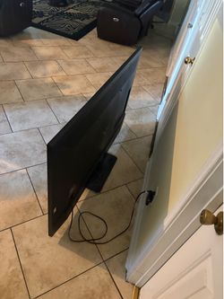 Vizio UHD 65-inch smart TV with stand
