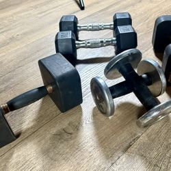 2 Pairs Of Dumbbells  5s And 10s Plus 2 Singles [Reebok) 15 And 20 lbs Respectively.