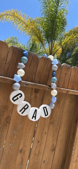 Friendship bracelet grad lei