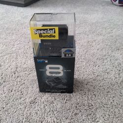 GoPro HERO8 Black Retail Bundle - Includes HERO8 Black Camera Plus Shorty, Head Strap, 32GB SD Card, and 2 Rechargeable Batteries