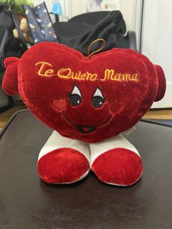 A heart shaped I love you mom plush.
