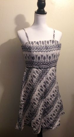 Ann Loft in black and white print strap dress