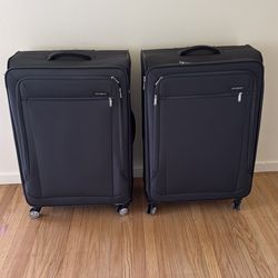 Two large Samsonite xtra-light 3.0 suitcases