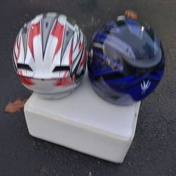 Two motorcycles helmets 