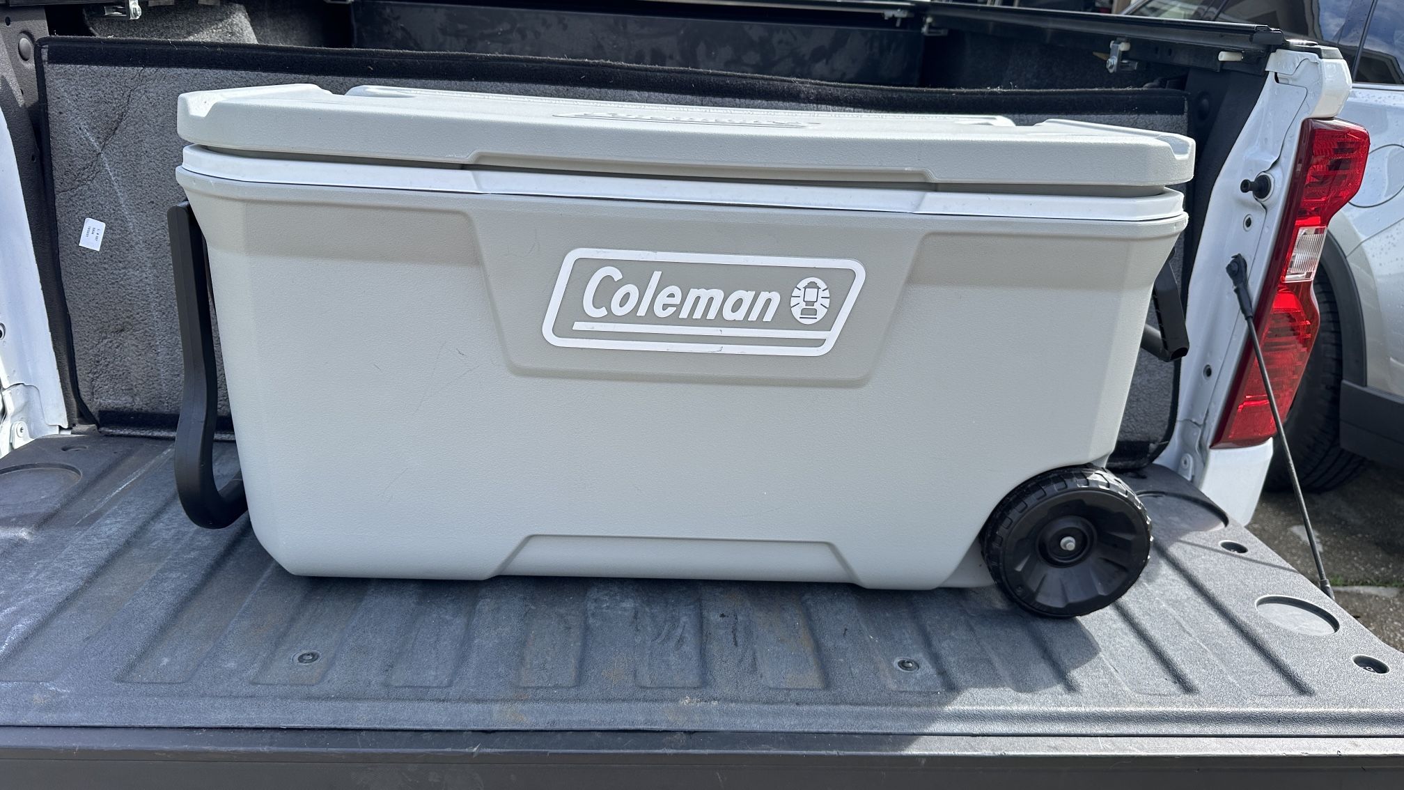 Coleman 316 Series 100 Quart Rolling Cooler Grey Polyethylene Tow Handle Tailgate Party BBQ Beach Camping Food Drink Cold Cooler
