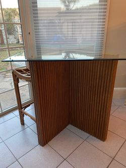 High table with four chairs