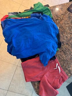 Free- 14 free kids Tee shirts Age 8 small/medium.