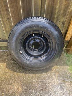 Firestone Wilderness tire on a black steel wheel 225/75/ R15- recommend wheel only 
