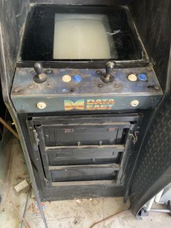 Vintage 80s arcade coin slot video game.