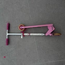 Pink Minnie Mouse scooter with princess helmet and pads