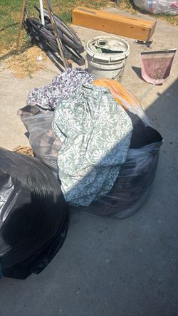 Bag of clothes and blankets