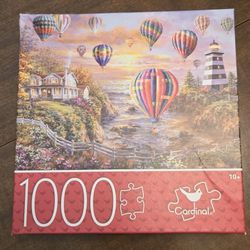 Cardinal Balloons Over Cottage Cove 1000 Piece Puzzle