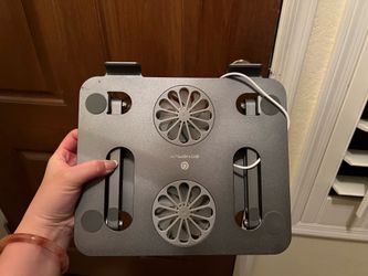 Laptop stand with cooling fan