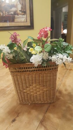 Decorative basket of flowers artificial