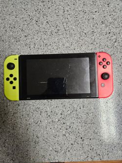 Nintendo Switch with Yellow and Red Joy-Cons