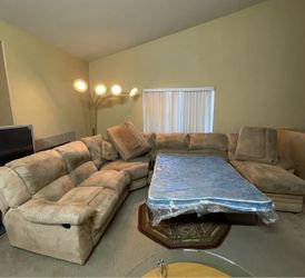 Large Beige Microfiber Sectional Sofa with Sleeper, Recliner, 3 Big Pillows and 2 Small Pillows